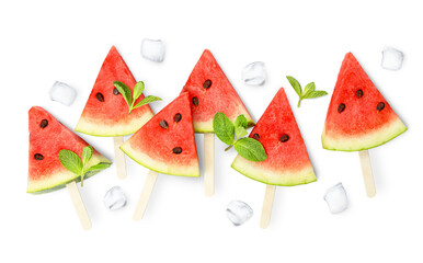 slices of watermelon on sticks with mint leaves and ice cubes on a white isolated background