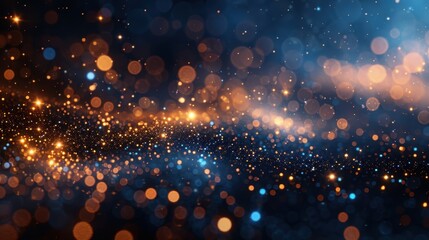 Obraz premium An abstract image featuring a dazzling pattern of golden and blue bokeh lights, creating a mesmerizing and vibrant visual display of shimmering light orbs and reflections.