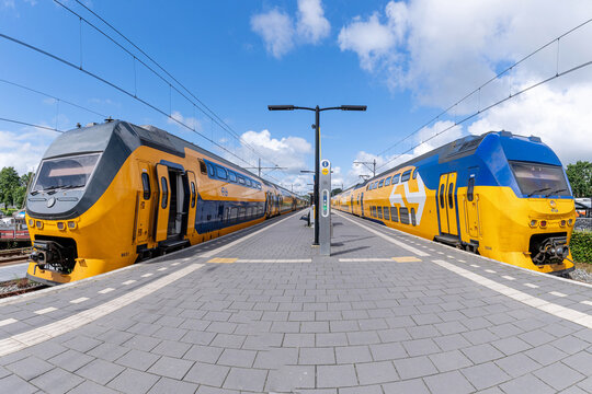 Enkhuizen, Netherlands -June 11, 2024: Nederlandse Spoorwegen VIRM trains at Enkhuizen railway station
