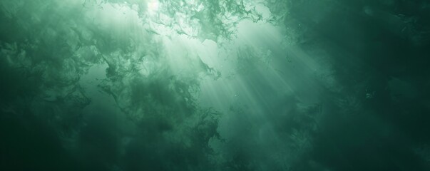 Obraz premium Sunbeams Through Deep Green Water
