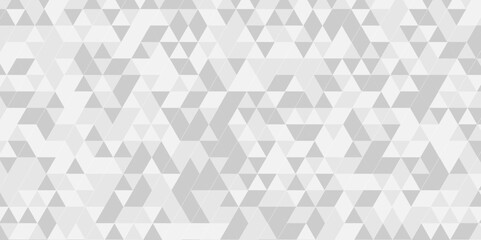 Fototapeta premium Vector geometric seamless technology gray and white triangle element light background. Abstract digital grid light pattern white Polygon Mosaic triangle Background, business and corporate background
