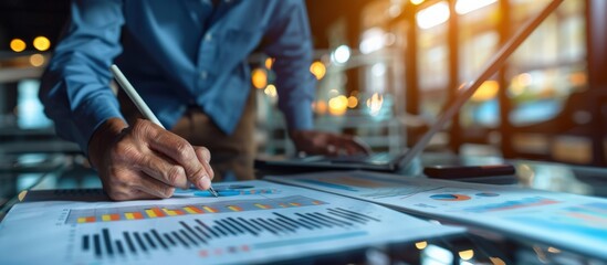 Businessman Analyzing Financial Charts and Data