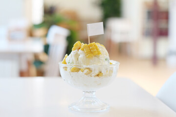 Corn ice cream in glass bowl with flag