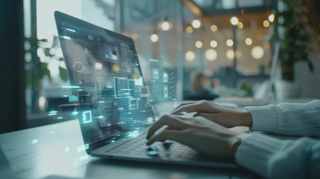 The hands typing on laptop