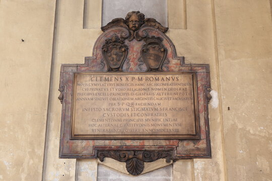Portico Sculpted Tablet at the Chiesa delle Santissime Stimmate di San Francesco Church in Rome, Italy