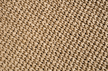 Beige raffia crochet texture. Crocheted bags, clutches, hats, wallets.