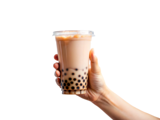 A close-up photo of a hand holding a iced bubble tea
