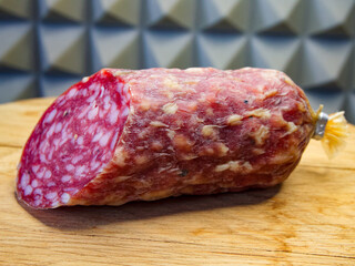 Close-up of salami, showing rich textures and colors, indicating freshness and culinary appeal.