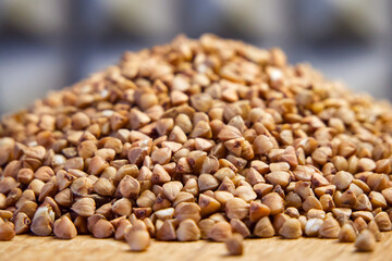 Raw Buckwheat Pile. Buckwheat grains in abundance, perfect for culinary and health themes.