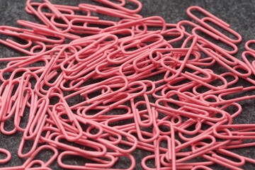 Colorful heap of paper clips - good office background