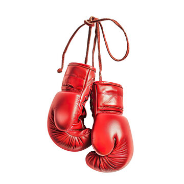 Pair of old red leather boxing gloves hanging, cut out