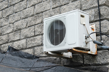 Air source heat pump installed in building. Sustainable and clean energy	