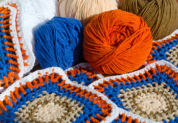 Grandmother's Square. Crochet texture close up. Hand knitted zigzag jewelry.