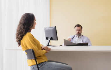 Portrait latin woman sick mentally sit chair with man doctor caucasian sitting two people talk...