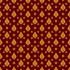 Seamless modern thai art pattern. Large pear shaped diamond and small golden flowers. Red background. Vector illustration.