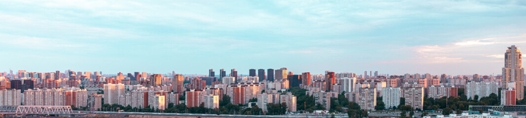 Panorama of a big city, bright blue sky. A place to copy the space.