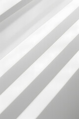 Fototapeta premium empty white room wall with shadow and light from windows, white interior background for product presentation, minimalist style