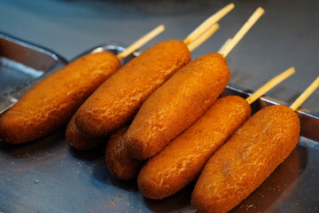 Corndogs are hotdogs made from cornmeal batter fried in hot cooking oil