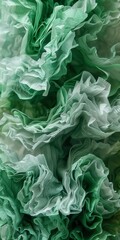 Fototapeta premium Close-Up View of Green and White Ruffled Fabric