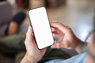 cell phone blank white screen mockup.hand holding texting using mobile on desk at office.background empty space for advertise.work people contact marketing business,technology