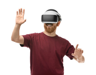 Naklejka premium Smiling man using virtual reality headset on white background