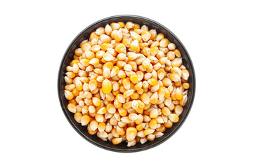 Organic Corn Seeds (Zea mays) or Makka, in a black ceramic bowl. Isolated on a white background. Top View