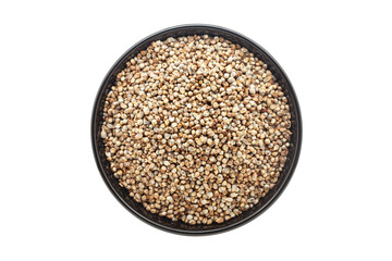 Organic Pearl Millet (Pennisetum glaucum) or Bajra, in a black ceramic bowl. Isolated on a white background. Top View