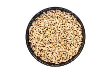 Organic  Barley (Hordeum Vulgare) or jau grains, in a black ceramic bowl. Isolated on a white background. Top View