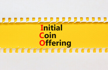 ICO initial coin offering symbol. Concept words ICO initial coin offering on beautiful yellow...