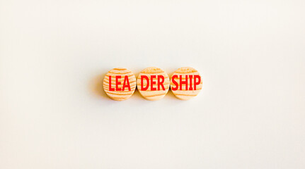 Leadership symbol. Concept word Leadership on beautiful wooden circles. Beautiful white background. Business leadership concept. Copy space.