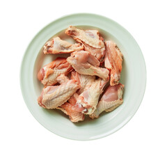 Raw chicken wings in a white bowl on transparent background, ready for cooking or grilling. Fresh and uncooked poultry perfect for your favorite recipes.