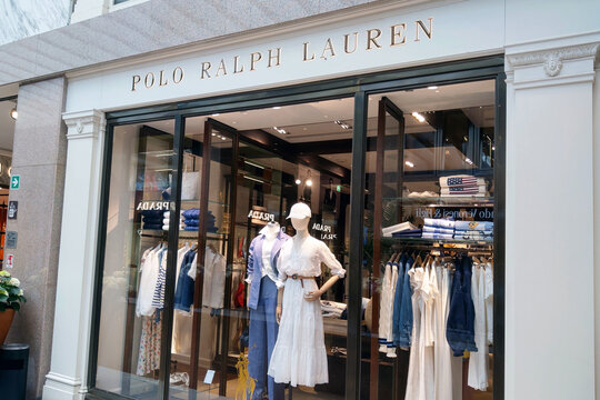 Bologna, Italy, May 16, 2024: Luxury Fashion Apparel Storefront Featuring Polo Ralph Lauren Display - Retail Design for Print, Card, Poster