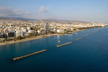 Drone aerial view of waterfront of modern coastal city. Limassol town Cyprus Europe