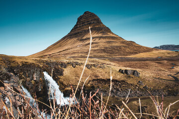 The famous mountain with a waterfall from the lord of the rings. untouched nature of Iceland