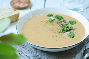 A bowl with mushroom cream soup