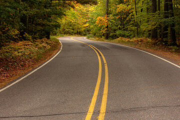 Hwy K winds around and through the norrth woods forest of Wisconsin, providing the traveler a few of the very colorful autumn scenery
