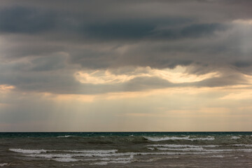 Heavy storm clouds moving in over Lake Michigan in mid-October at Harrington Beach State Park, Belgium, Wisconsin