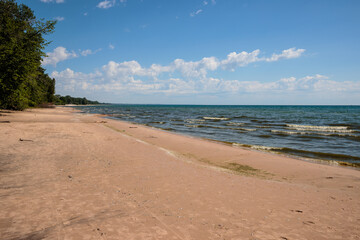 Looking north along the beach at Harrington Beach State Park, Belgium, Wisconsin in early June, ...