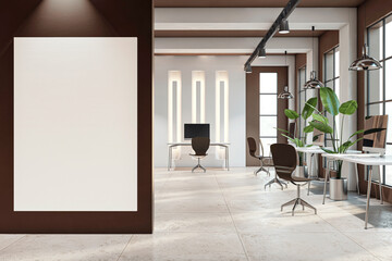 Modern office interior with a blank white canvas frame, designer furniture and large windows on a sunny background, concept of a creative workspace. 3D Rendering