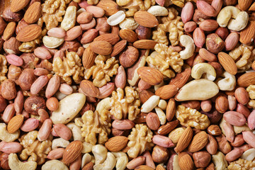 mixed nuts as background, top view