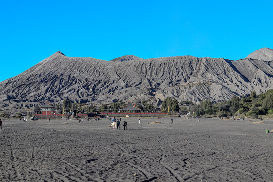 view of the bromo mountain range with black sand