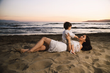 Mother and Child Enjoying Beach Sunset