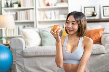 Portrait of beauty body slim healthy asian woman big smile cooking and preparing vegan food healthy holding apple, green apple, dental, teeth, fruit at home.Diet.Fitness, healthy food