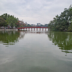 Hanoi, Vietnam - 9 Feb, 2024: Bridge to Ngoc Son Temple on an islet in Hoan Kiem Lake, Hanoi, Vietnam