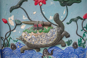 Hanoi, Vietnam - 9 Feb, 2024: Turtle art on a wall of the Ngoc Son Temple, Hanoi, Vietnam