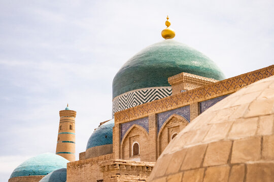 Green dome of Pahlavan Mahmud Mausoleum in the ancient city of Khiva, Uzbekistan