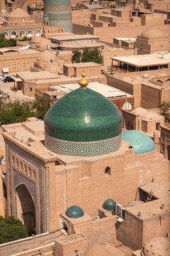 View of Khiva, Green dome of Pahlavan mahmud Mausoleum, Kalta Minor, View from Islam Khoja Minaret in the ancient city of Khiva, Uzbekistan