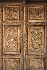Carved wooden doors, outside Registan Square, in Samarkand, Uzbekistan
