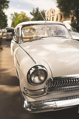 Vintage car, beige, in Samarkand, Uzbekistan