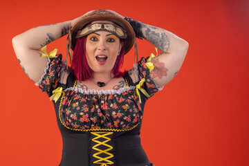 Woman wearing a dress and hat for a June party in fun poses